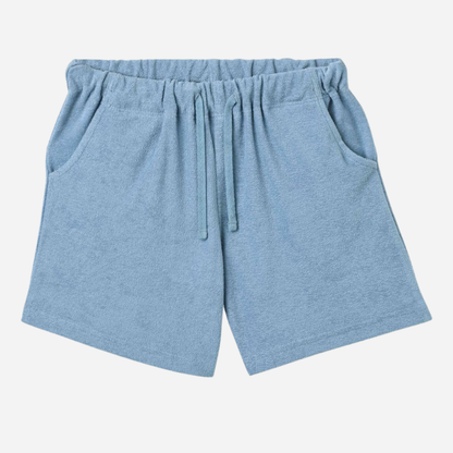 Sold at Bombon Shop, designed by Wheat, faded denim organic cotton jersey shorts with elastic waistband and soft washed finish.
