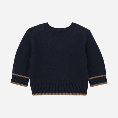 Sold at Bombon shop, designed by 1+ in the family — striped navy and slate blue hooded dress with long sleeves, ruffle hem, and buttoned collar. back