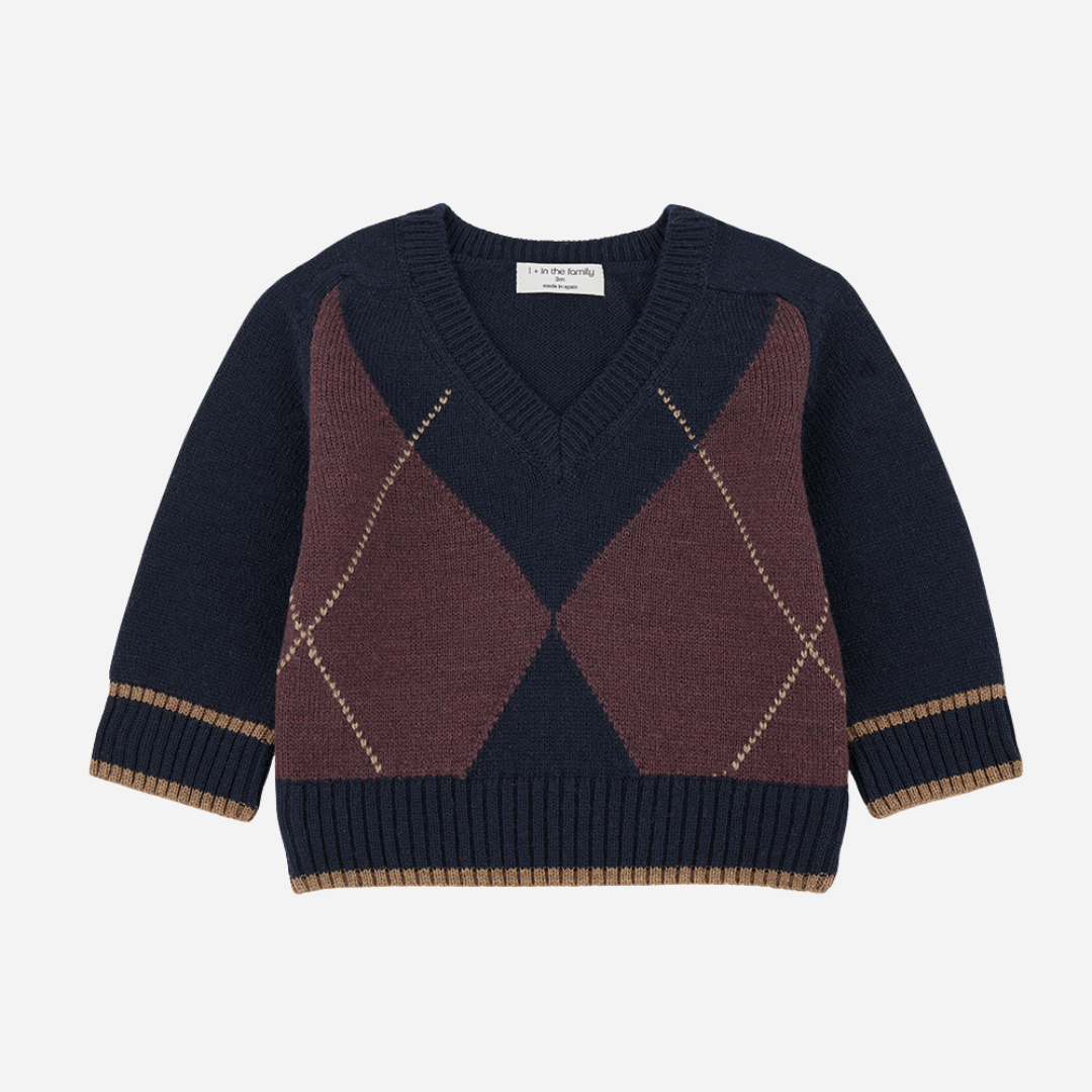 Sold at Bombon shop, designed by 1+ in the family — striped navy and slate blue hooded dress with long sleeves, ruffle hem, and buttoned collar. front