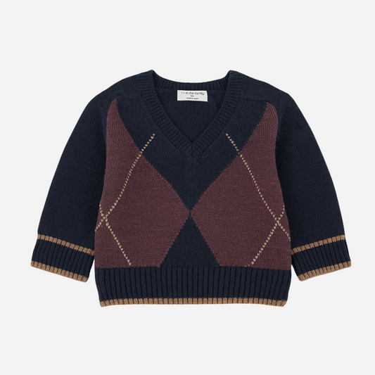 Sold at Bombon shop, designed by 1+ in the family — striped navy and slate blue hooded dress with long sleeves, ruffle hem, and buttoned collar. front