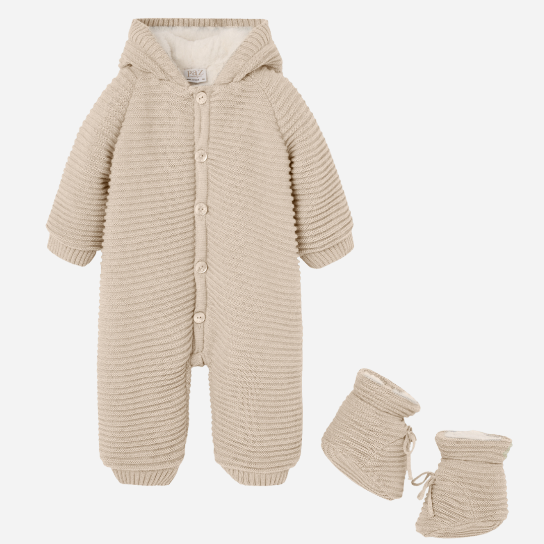 Sold at Bombon shop, designed by Paz Rodriguez, beige Koala knit jumpsuit with hood and matching booties