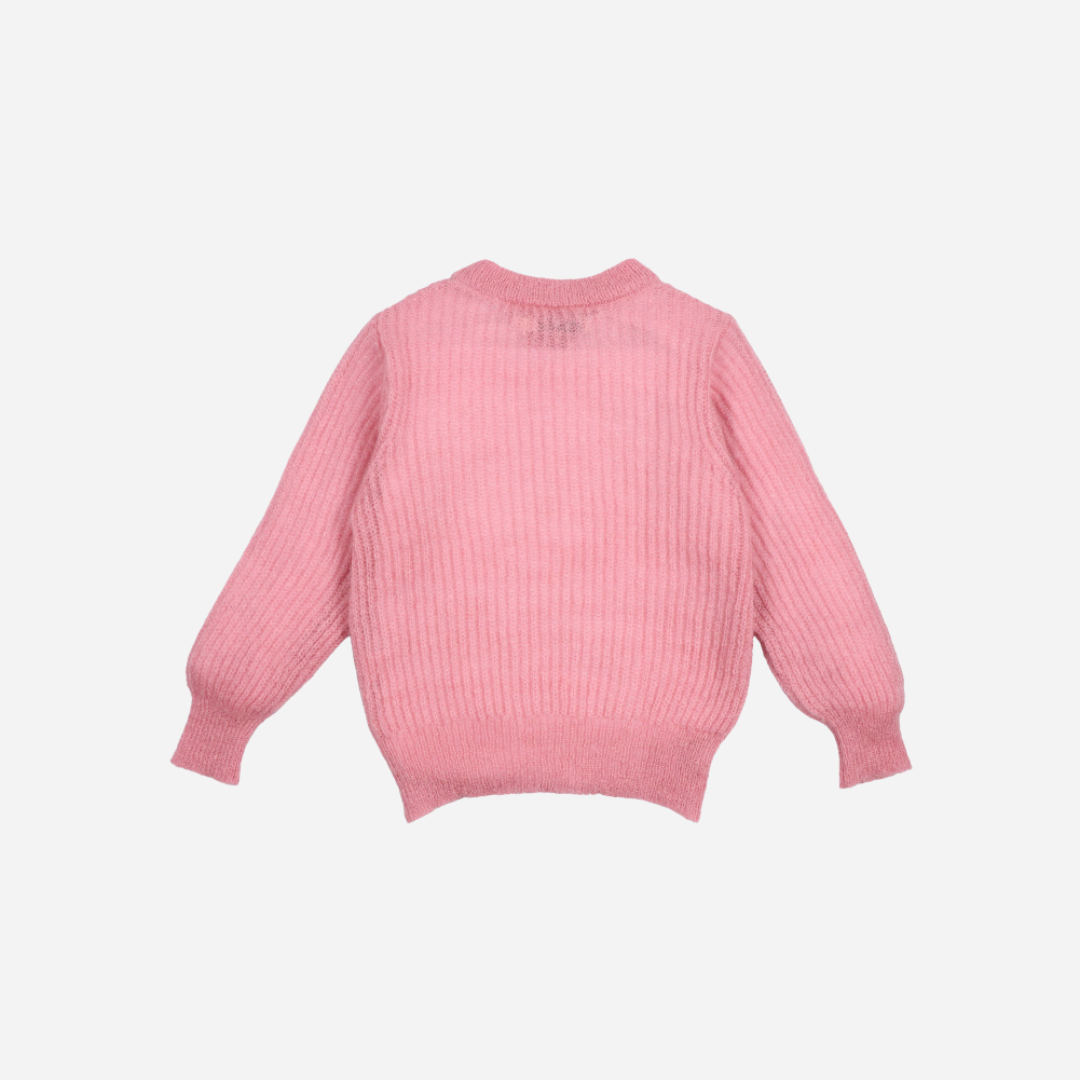 Sold at Bombon shop, this girls’ jumper by The New Society comes in a soft pink ribbed knit with a classic crew neckline and relaxed fit—perfect for cozy, everyday layering with a sweet touch. back