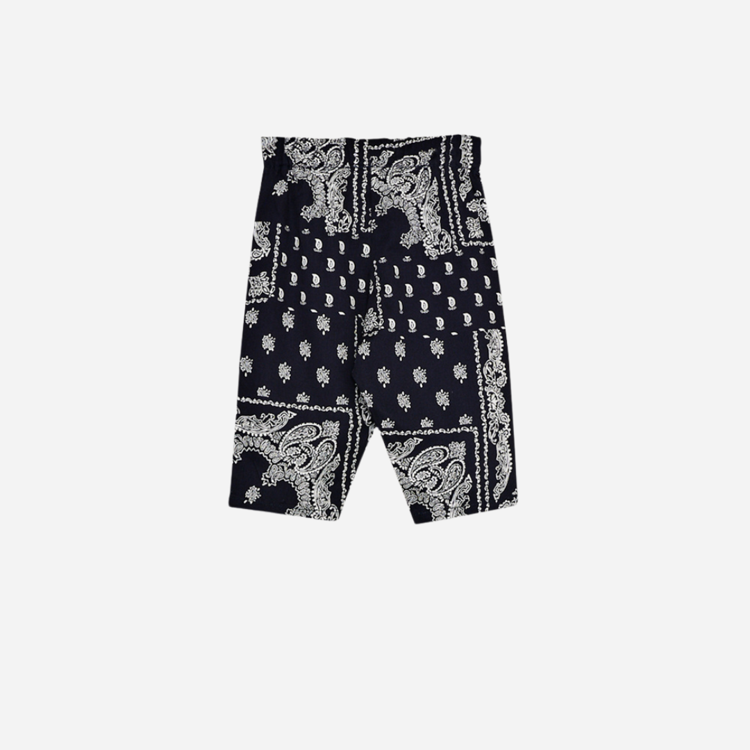Sold at Bombon shop, these baby and toddler boy pants by The New Society feature a matching navy and white bandana print with an elastic waistband for an easy, comfortable fit—perfect for pairing with the coordinated shirt or mixing with basics. baby version back