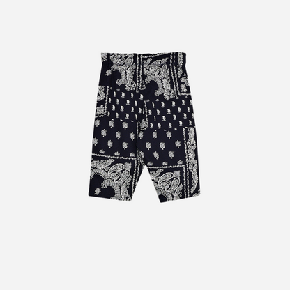 Sold at Bombon shop, these baby and toddler boy pants by The New Society feature a matching navy and white bandana print with an elastic waistband for an easy, comfortable fit—perfect for pairing with the coordinated shirt or mixing with basics. baby version back
