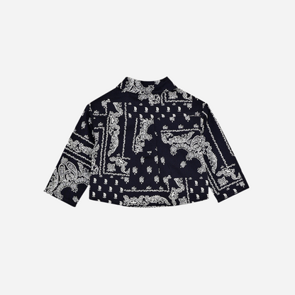 Sold at Bombon shop, this baby and toddler boy shirt by The New Society features a bold navy and white bandana-style print, long sleeves, front buttons, and a chest pocket embroidered with “TNS” for a stylish, laid-back look. baby version, back