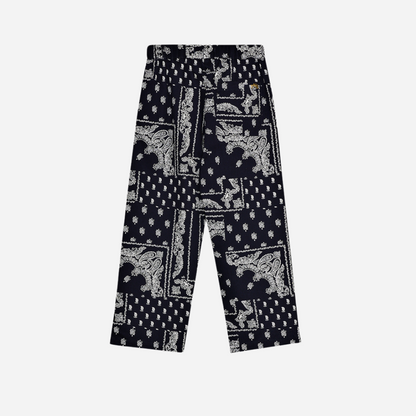 Sold at Bombon shop, these baby and toddler boy pants by The New Society feature a matching navy and white bandana print with an elastic waistband for an easy, comfortable fit—perfect for pairing with the coordinated shirt or mixing with basics. toddler version, back