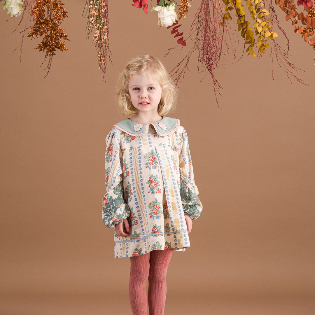 sold at Bombon shop, designed by Bachaa Blouse, 100% ECOVERO® Viscose, Block Print, Hand embroidered and lace trimmed collar, Hand embroidery on the sleeves, Contrasting tape, Gathers at the front and back, Long elasticated sleeves, Contrasting buttons and yoke at the back. model view