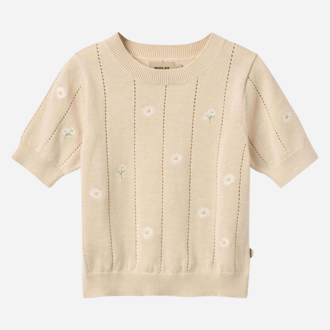 Sold at Bombon Shop, designed by Wheat, sandshell white flowers organic cotton short sleeve knit sweater with floral knit pattern and soft neutral tone.