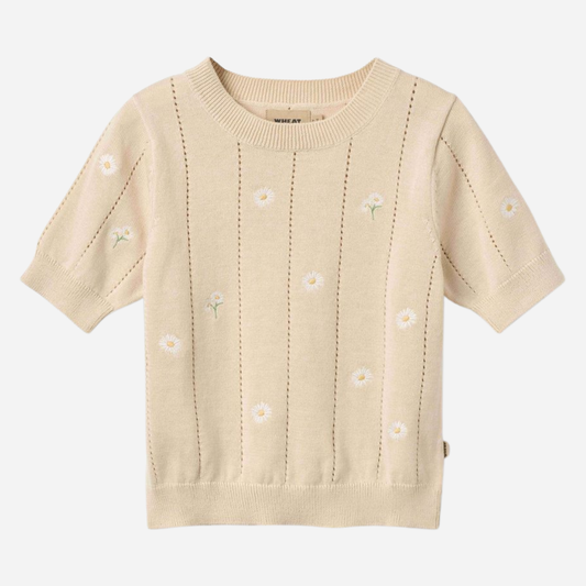 Sold at Bombon Shop, designed by Wheat, sandshell white flowers organic cotton short sleeve knit sweater with floral knit pattern and soft neutral tone.