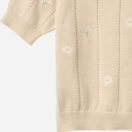 Sold at Bombon Shop, designed by Wheat, sandshell white flowers organic cotton short sleeve knit sweater with floral knit pattern and soft neutral tone.
