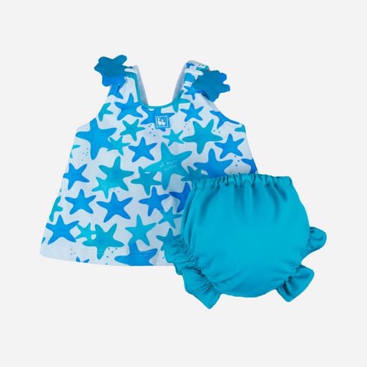 sold at Bombon shop, designed by Al Agua Patos Brand, this star print two piece baby bathing suit in blue is perfect for summer. Front view