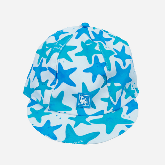 sold at Bombon shop, designed by Al Agua Patos Brand, this star print cap provides sun coverage and is waterproof. Perfect for summer. front view