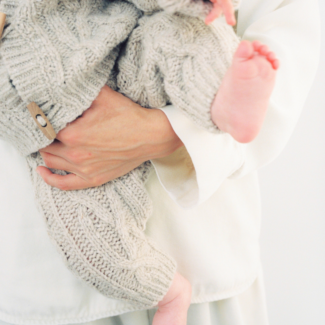 Sold at Bombon shop, these baby pants by The New Society feature a cozy cable knit texture with an elasticated waist and cuffs for a comfortable everyday fit. model 2