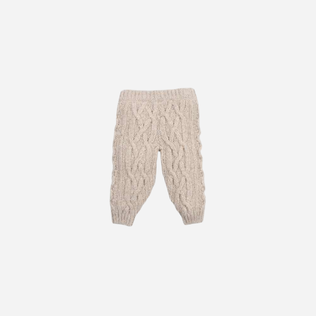 Sold at Bombon shop, these baby pants by The New Society feature a cozy cable knit texture with an elasticated waist and cuffs for a comfortable everyday fit. back