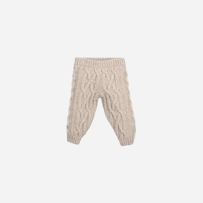 Sold at Bombon shop, these baby pants by The New Society feature a cozy cable knit texture with an elasticated waist and cuffs for a comfortable everyday fit. front