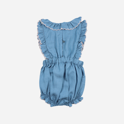 sold at Bombon, designed by The New Society light blue chambray baby romper with ruffle shoulders in 100% cotton soft breathable summer outfit
