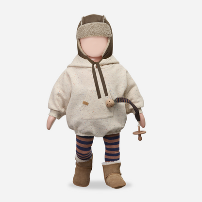 Sold at Bombon shop, designed by 1+ in the family — speckled cream baby romper with hood, long sleeves, and front kangaroo pocket. mannequin