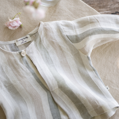 Sold at Bombon Shop, designed by 1+ in the family, beige striped baby shirt with lightweight cotton fabric and relaxed summer fit.