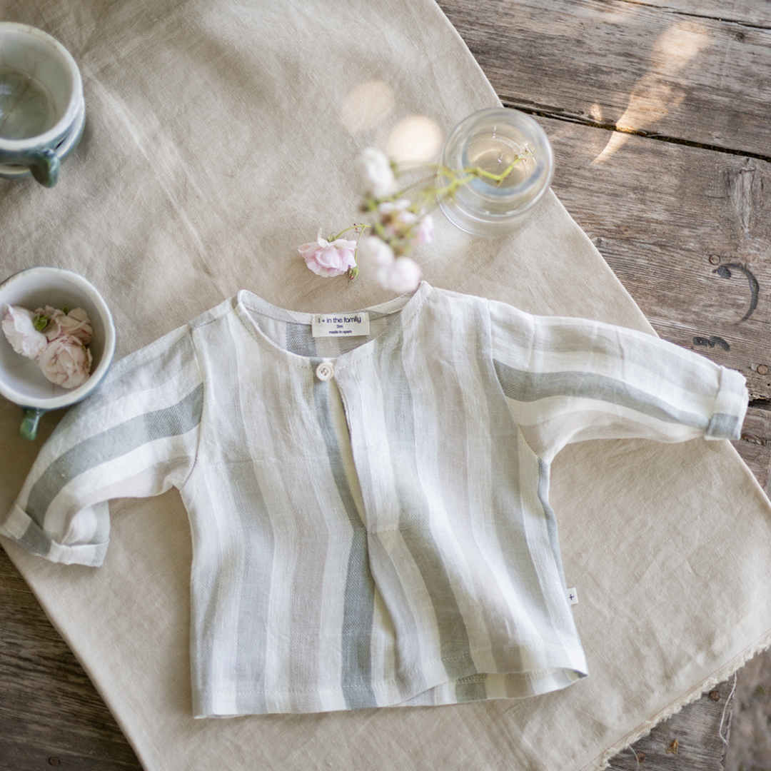 Sold at Bombon Shop, designed by 1+ in the family, beige striped baby shirt with lightweight cotton fabric and relaxed summer fit.