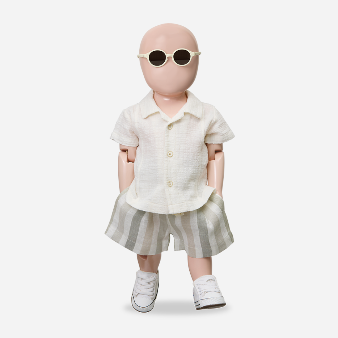 Sold at Bombon Shop, designed by 1+ in the family, beige striped baby bermuda shorts with elastic waistband and soft cotton fabric.