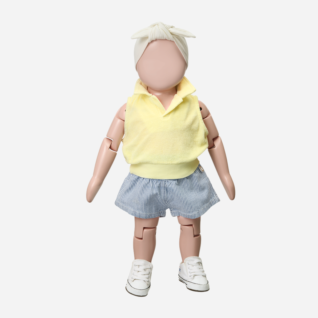 Sold at Bombon Shop, designed by 1+ in the family, lemon baby polo top with soft cotton fabric and classic collar.
