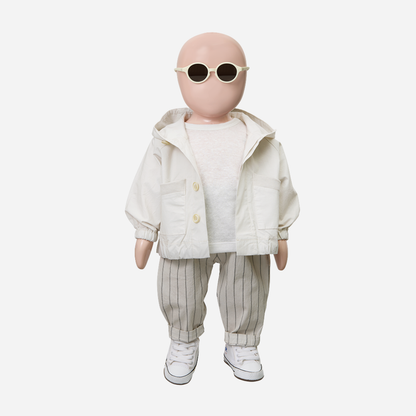 Sold at Bombon Shop, designed by 1+ in the family, off-white baby hooded jacket with front pockets and soft cotton fabric.