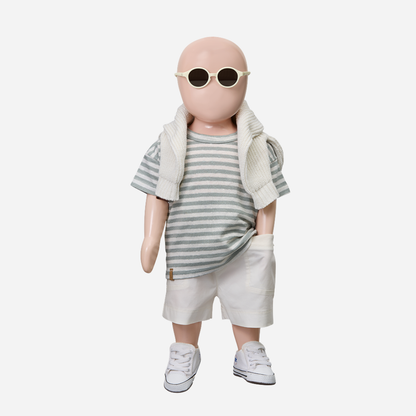 Sold at Bombon Shop, designed by 1+ in the family, off-white baby bermuda shorts with front button detail and soft cotton fabric.