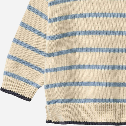Sold at Bombon Shop, designed by Wheat, faded denim stripe organic cotton knit pullover with soft blue and neutral horizontal stripes.