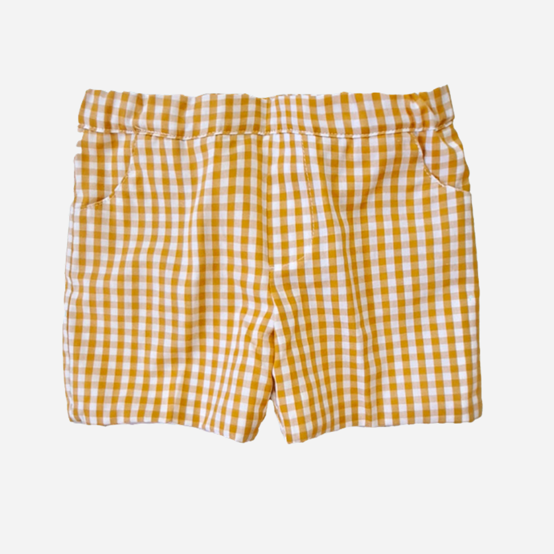 sold at Bombon shop, designed by Paloma de la o brand, these mustard vichy pattern shorts for baby boys and toddlers are perfect for spring and summer. 