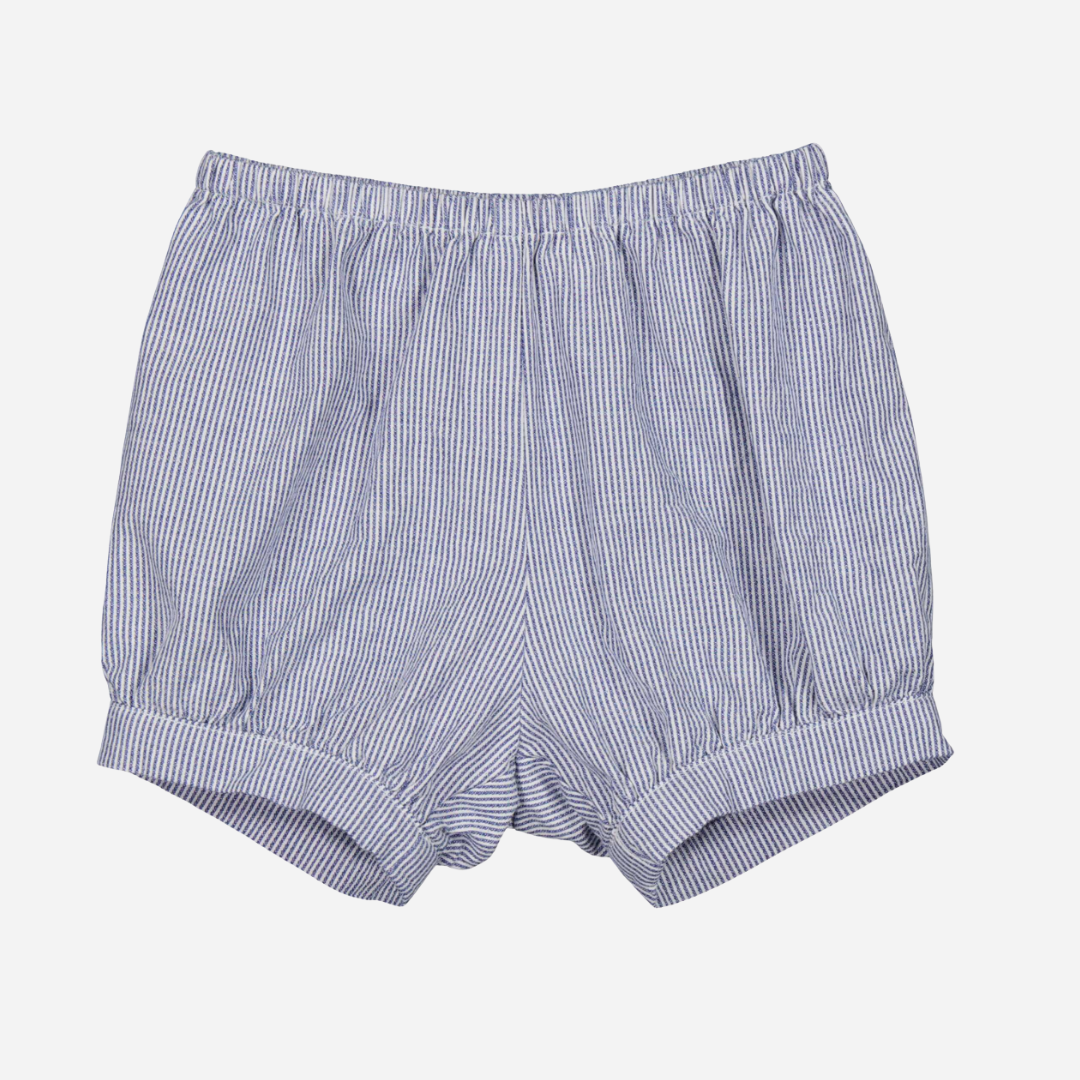 Sold at Bombon shop, designed by Mar Mar Copenhagen brand, this thin blue stripe shorts for baby boys and toddlers is perfect for spring and summer.