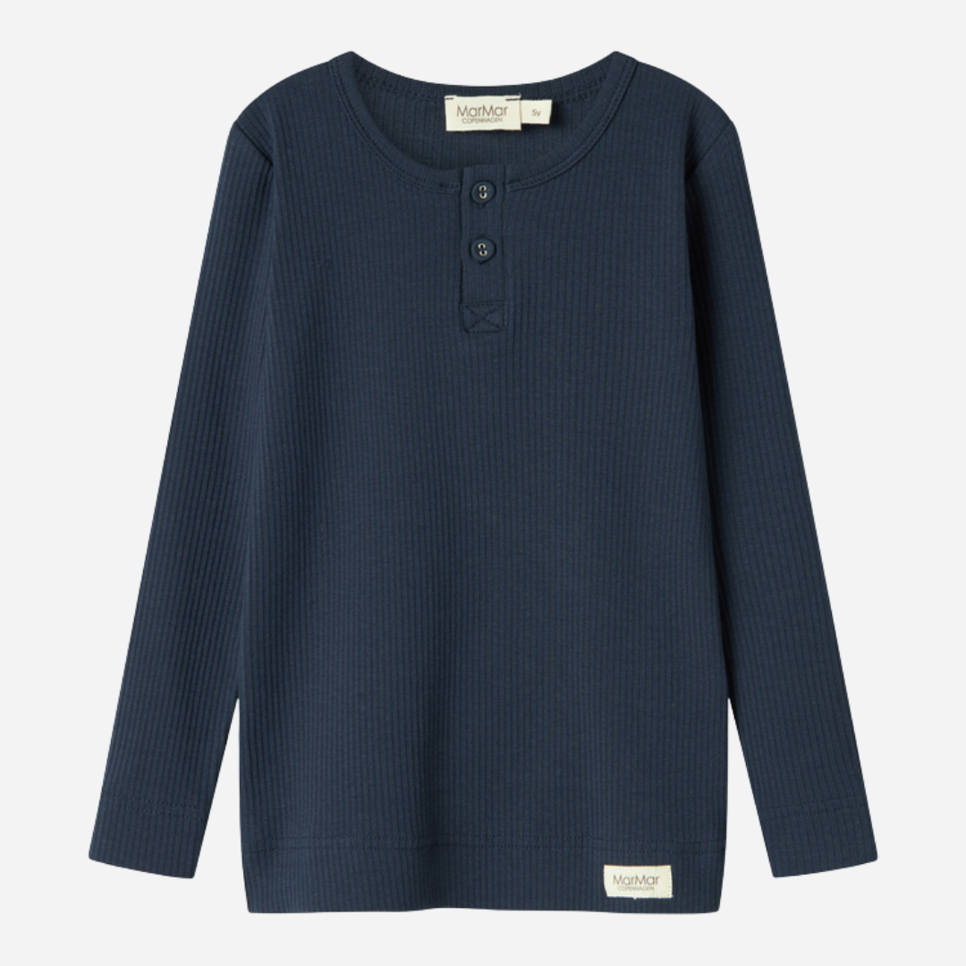 Sold at Bombon shop, designed by MarMar Copenhagen — navy ribbed organic cotton long-sleeve baby top with buttoned neckline, part of a matching set.
