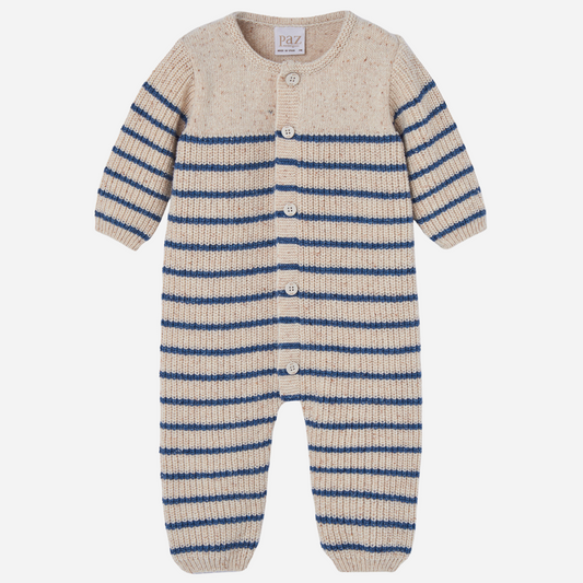 Sold at Bombon shop, designed by Paz Rodriguez, beige knit baby jumpsuit with blue horizontal stripes and front button closure.