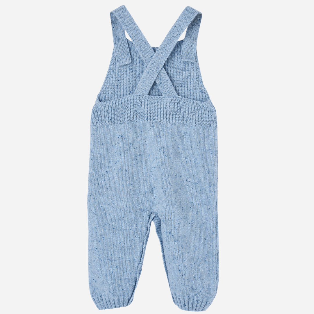 Sold at Bombon shop, designed by Paz Rodriguez, blue knit baby overalls with front pocket and shoulder buttons. back