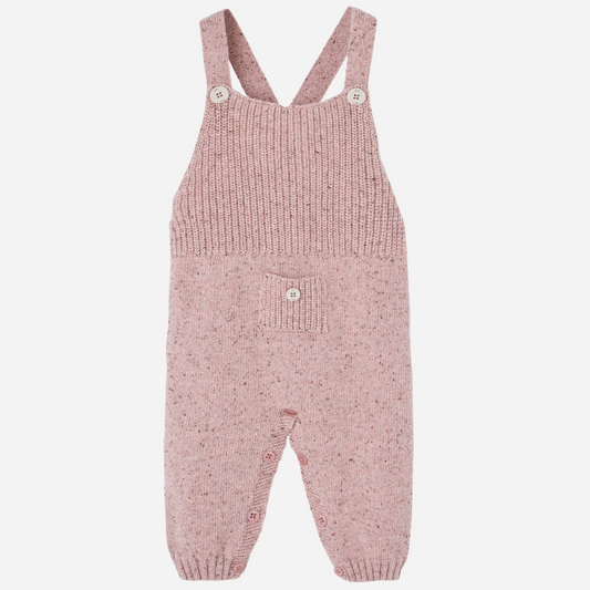 Sold at Bombon shop, designed by Paz Rodriguez. Cream floral muslin baby bodysuit with ruffle collar paired with pink knit overalls featuring front pocket and button straps.