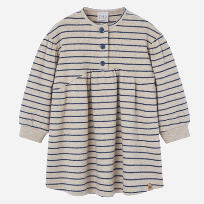 Sold at Bombon shop, designed by Paz Rodriguez, cream and navy striped knit dress with gathered waist and three-button front.