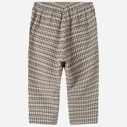 Sold at Bombon shop, designed by MarMar Copenhagen. Beige and navy check cotton pants with elastic waistband, pair perfectly with the matching beige shirt.