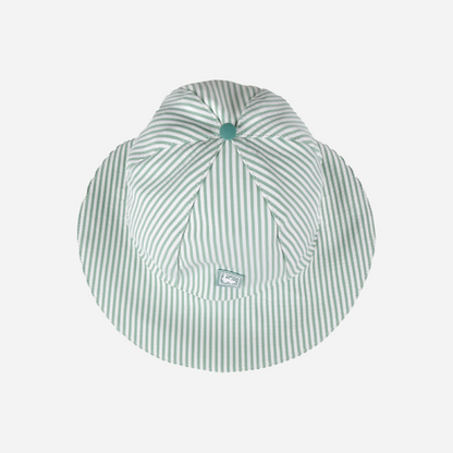 sold at Bombon shop, designed by Al Agua Patos Brand, this green and white striped baby hat provides sun coverage and is waterproof. Perfect for summer.top view
