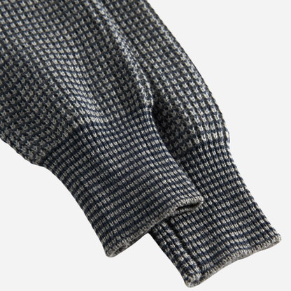 Sold at Bombon shop, designed by MarMar Copenhagen. Blue and beige textured knit baby pants with ribbed cuffs, pair perfectly with the matching knit sweater.