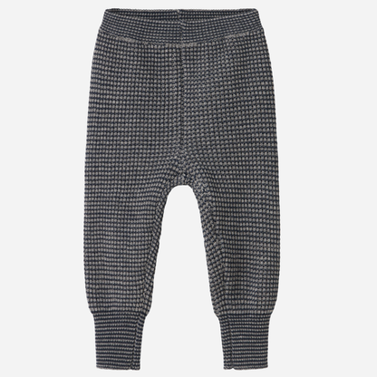 Sold at Bombon shop, designed by MarMar Copenhagen. Blue and beige textured knit baby pants with ribbed cuffs, pair perfectly with the matching knit sweater.