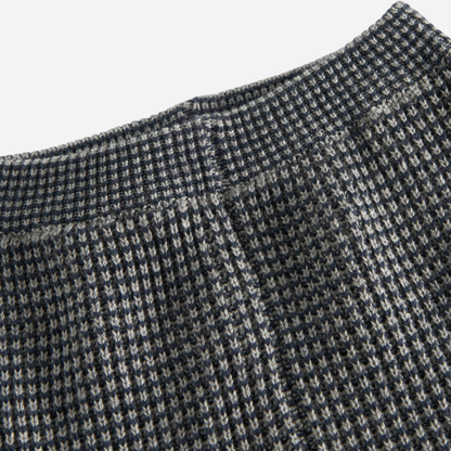 Sold at Bombon shop, designed by MarMar Copenhagen. Blue and beige textured knit baby pants with ribbed cuffs, pair perfectly with the matching knit sweater.