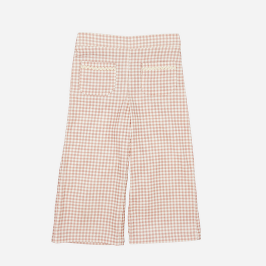 Sold at Bombon shop, designed by Fina Ejerique, pink gingham corduroy baby pants with ric-rac trim on the back pockets, styled to pair with the matching blouse. front