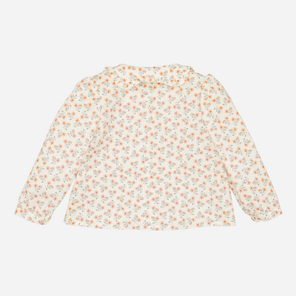 Sold at Bombon shop, designed by Fina Ejerique, floral viyella blouse with ruffled collar, pairs perfectly with the beige textured skirt and pink vest. back