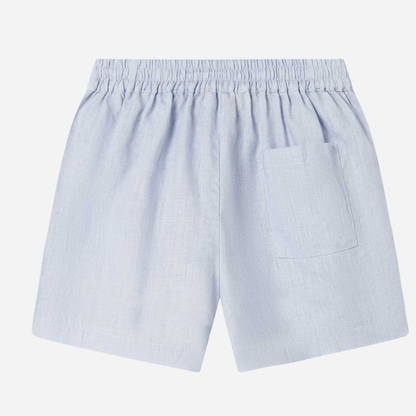 Sold at Bombon shop, designed by Mar Mar Copenhagen, Pinon children’s shorts in Blue Mist linen