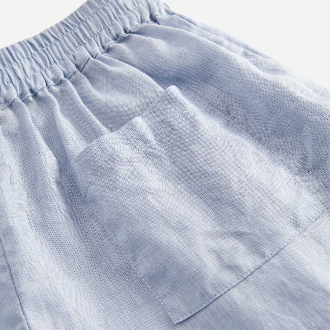 Sold at Bombon shop, designed by Mar Mar Copenhagen, Pinon children’s shorts in Blue Mist linen