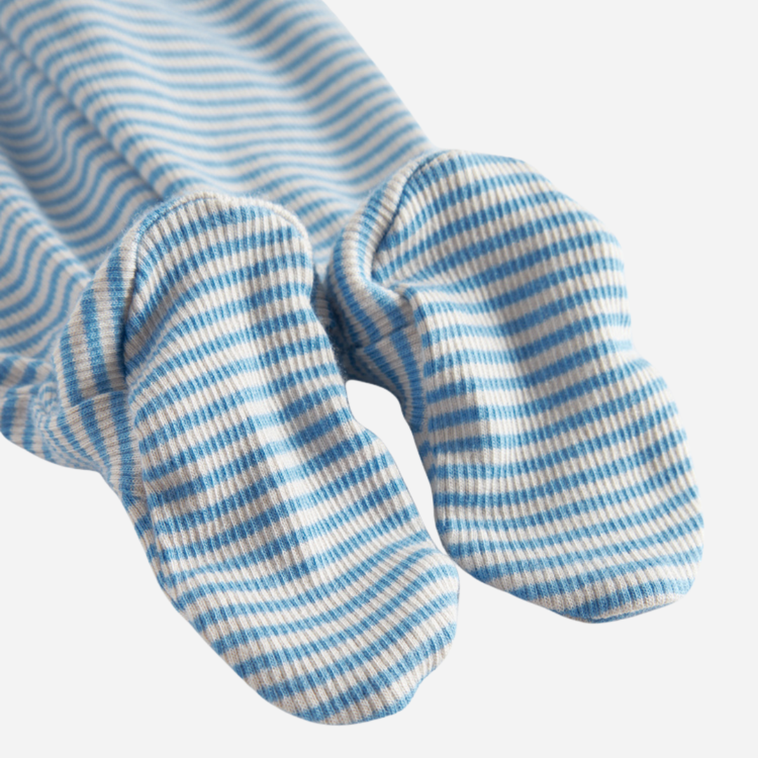 Sold at Bombon shop, designed by MarMar Copenhagen. Sky blue and cream striped baby footed pants, pair perfectly with the matching blue striped cardigan.