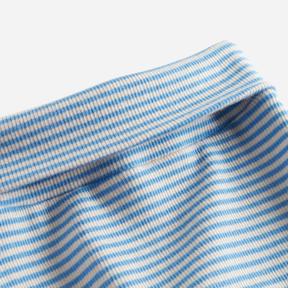 Sold at Bombon shop, designed by MarMar Copenhagen. Sky blue and cream striped baby footed pants, pair perfectly with the matching blue striped cardigan.