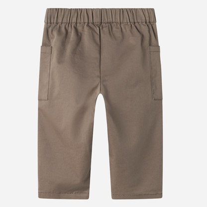 Sold at Bombon shop, designed by MarMar Copenhagen — taupe 100% cotton baby pants with front pockets and elastic waistband, pairs perfectly with the striped knit cardigan