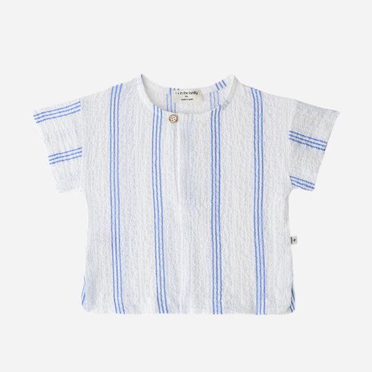 Sold at Bombon Shop, designed by 1+ in the family, ultramarine striped baby shirt with lightweight cotton fabric and relaxed summer silhouette.