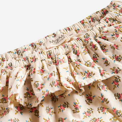 Sold at Bombon shop, designed by MarMar Copenhagen — floral cotton baby bloomers with ruffled waist, pairs perfectly with matching floral blouse.