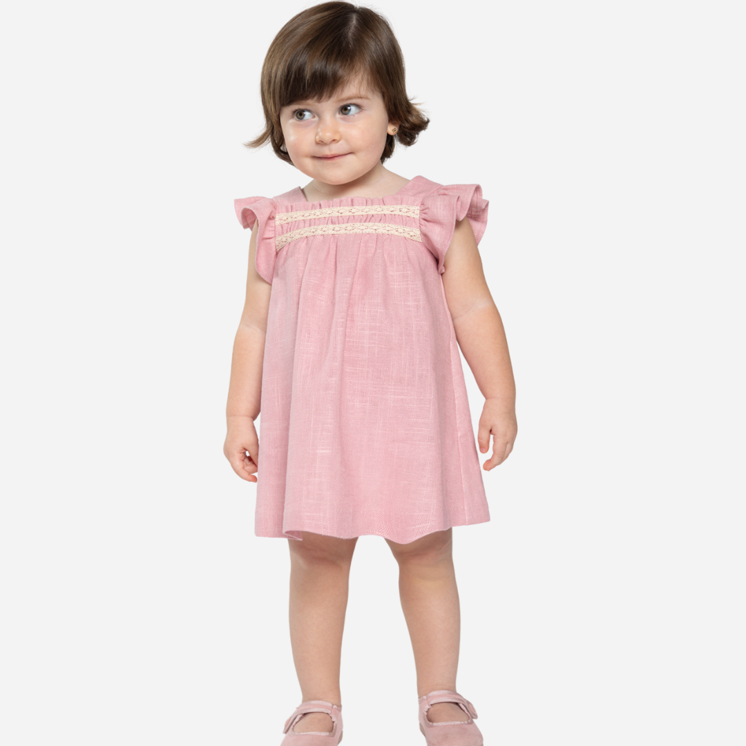 Offered in Bombon shop, designed by Fina Ejerique brand, red ruffle baby dress ideal for spring and summer. Baby model view